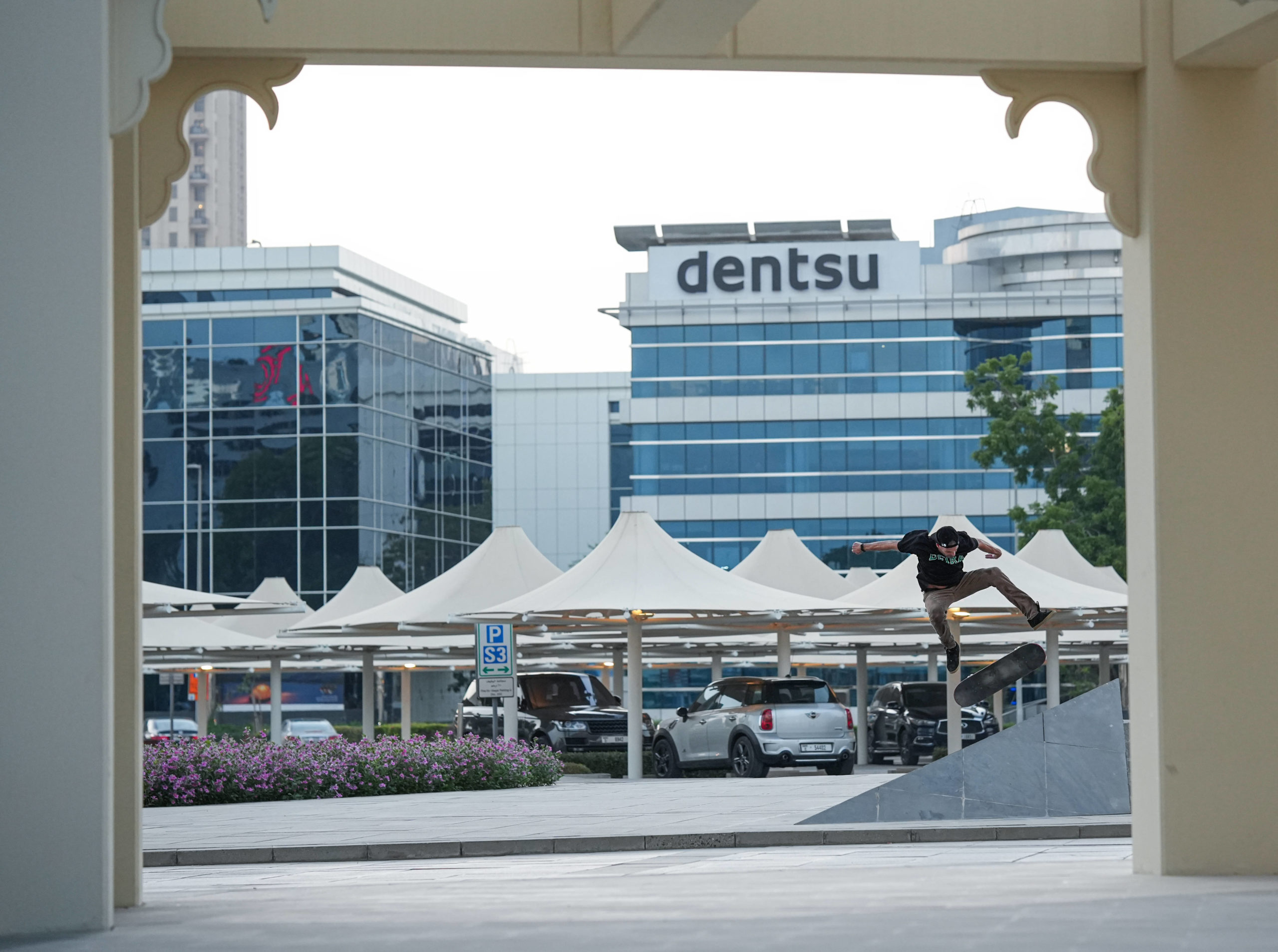 Light_myself, kickflip to fakie in media city, photo by Jim Bacalso